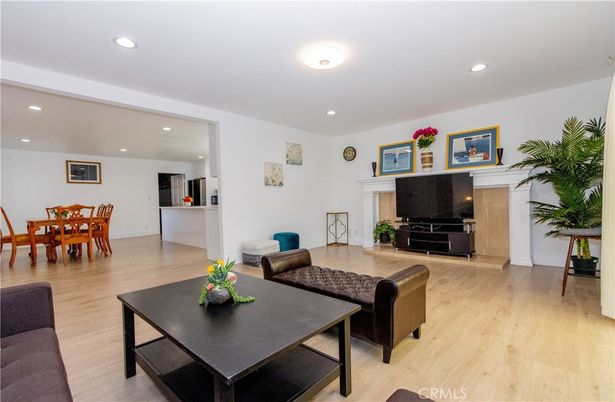 Dining room, Fireplace, Interior, Living room, Recessed Lighting, Wood Texture Flooring