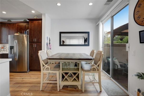 Dining room, Interior, Kitchen, Recessed Lighting, Stainless Steel Appliances, Wood Texture Flooring