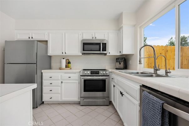 Interior, Kitchen, Stainless Steel Appliances, Tile Countertops
