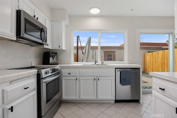 Interior, Kitchen, Recessed Lighting, Tile Countertops