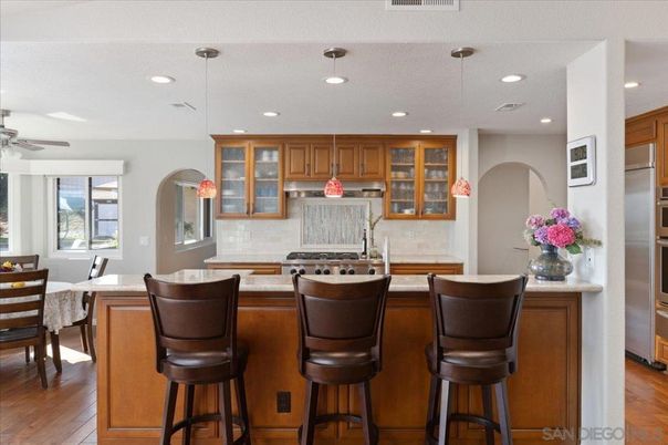 Dining room, Interior, Kitchen, Pendant Lights, Recessed Lighting, Stainless Steel Appliances, Wood Texture Flooring