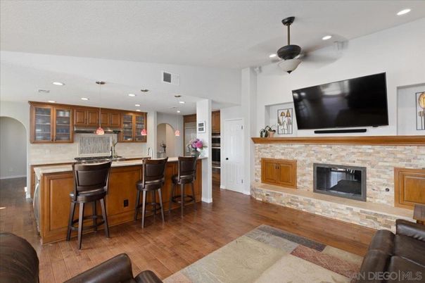 Fireplace, Interior, Kitchen, Pendant Lights, Recessed Lighting, Stone Walls, Wood Texture Flooring
