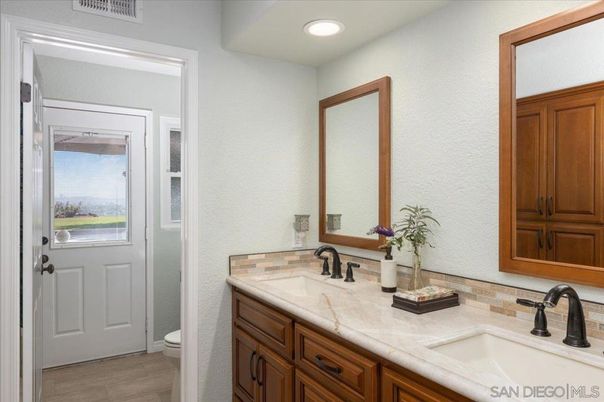 Bathroom, Dual Sink Vanities, Interior, Recessed Lighting, Wood Texture Flooring