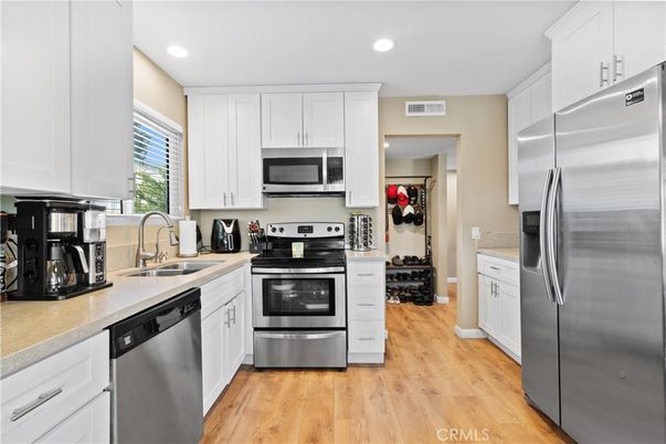 Interior, Kitchen, Recessed Lighting, Stainless Steel Appliances, Wood Texture Flooring