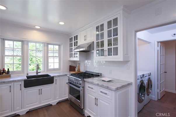 Interior, Kitchen, Recessed Lighting, Washer, Wood Texture Flooring