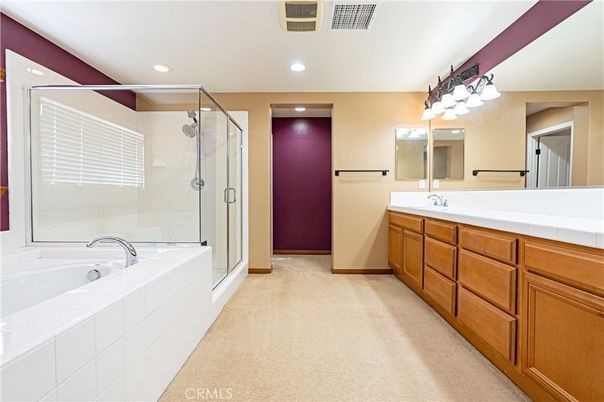 Bathroom, Dual Sink Vanities, Glass Shower, Interior, Recessed Lighting, Tile Countertops