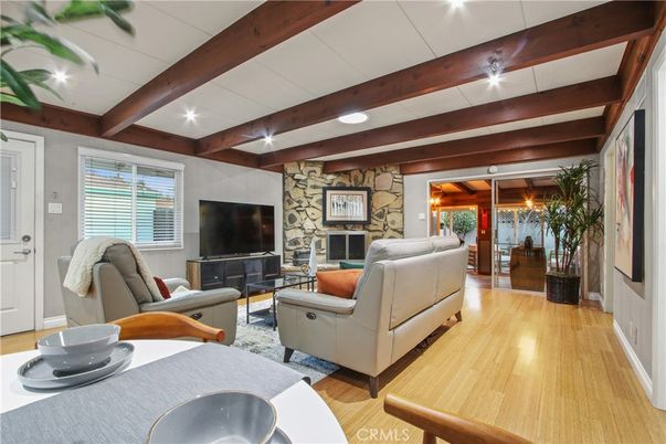 Fireplace, Interior, Living room, Recessed Lighting, Stone Walls, Wooden Beams, Wood Texture Flooring