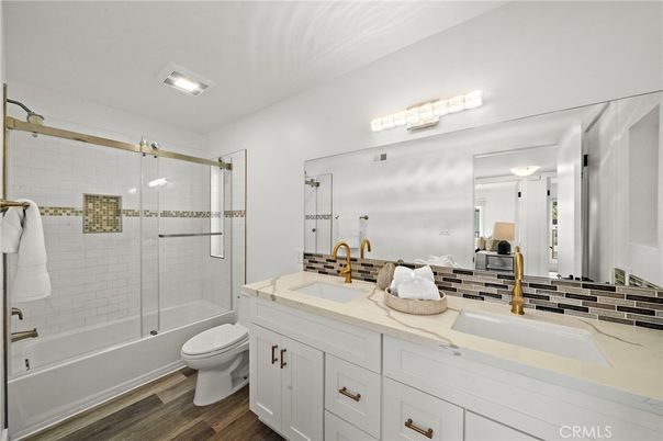 Bathroom, Dual Sink Vanities, Glass Shower, Interior, Wood Texture Flooring