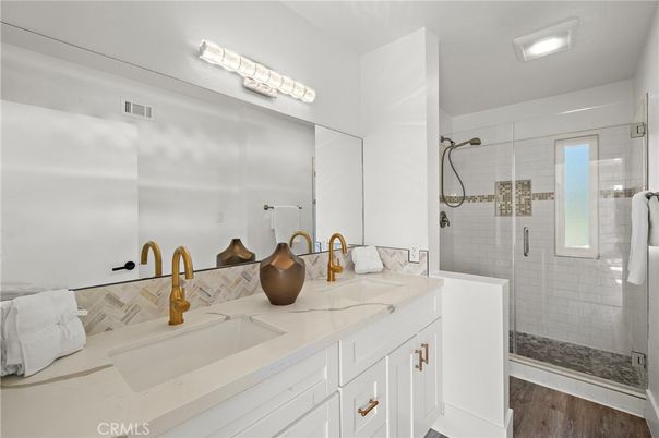 Bathroom, Dual Sink Vanities, Glass Shower, Interior, Wood Texture Flooring