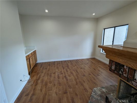Empty room, Fireplace, Interior, Recessed Lighting, Wood Texture Flooring