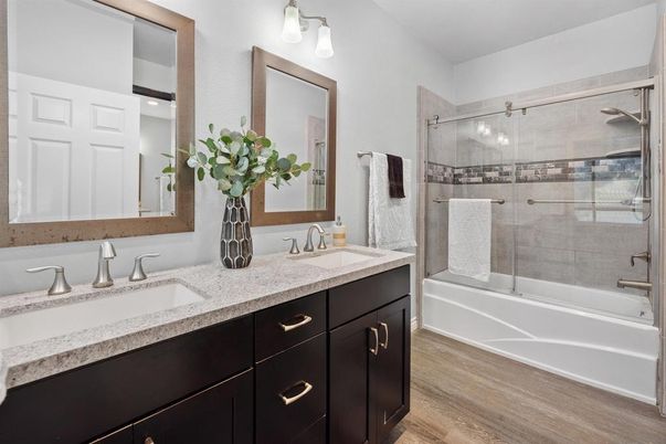 Bathroom, Dual Sink Vanities, Glass Shower, Interior, Wood Texture Flooring