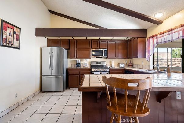Interior, Kitchen, Recessed Lighting, Stainless Steel Appliances, Tile Countertops