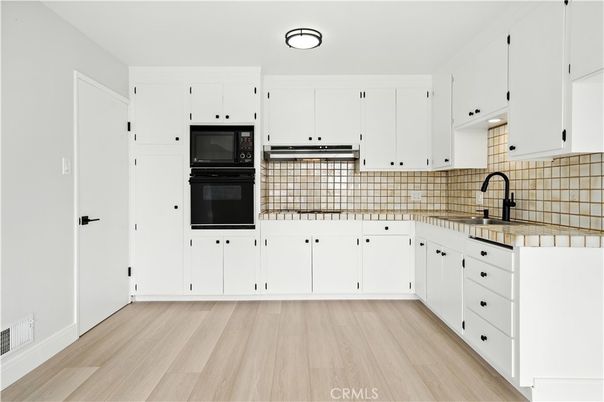 Interior, Kitchen, Tile Countertops, Wood Texture Flooring