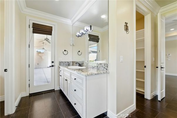 Bathroom, Dual Sink Vanities, Interior, Recessed Lighting, Wood Texture Flooring