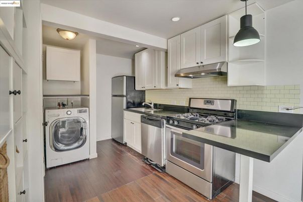 Interior, Kitchen, Pendant Lights, Recessed Lighting, Stainless Steel Appliances, Washer, Wood Texture Flooring
