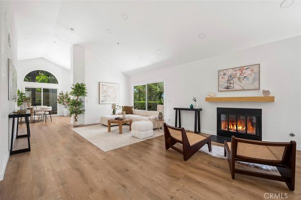 Dining room, Fireplace, Interior, Living room, Recessed Lighting, Wood Texture Flooring