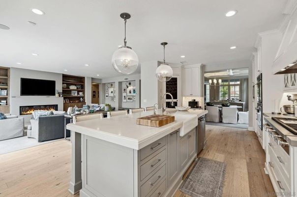 Dining room, Fireplace, Interior, Kitchen, Living room, Pendant Lights, Recessed Lighting, Stainless Steel Appliances, Wood Texture Flooring