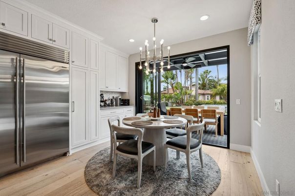 Dining room, Interior, Kitchen, Pendant Lights, Recessed Lighting, Stainless Steel Appliances, Wood Texture Flooring