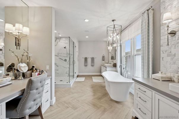 Bathroom, Chandelier, Free Standing Baths, Glass Shower, Interior, Marble Walls, Pendant Lights, Recessed Lighting, Wood Texture Flooring