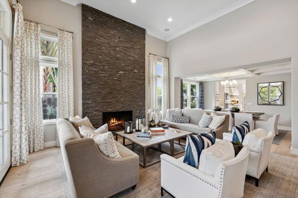 Chandelier, Dining room, Fireplace, Interior, Living room, Recessed Lighting, Stone Walls, Wood Texture Flooring