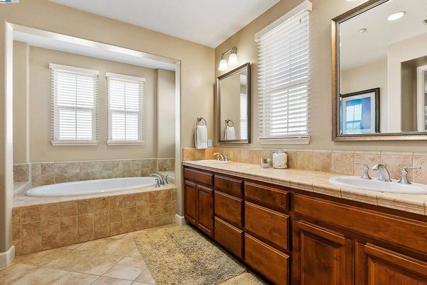 Bathroom, Dual Sink Vanities, Interior, Recessed Lighting, Tile Countertops