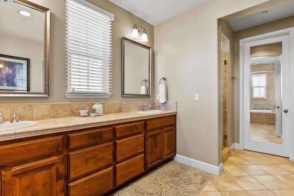 Bathroom, Dual Sink Vanities, Interior, Recessed Lighting, Tile Countertops