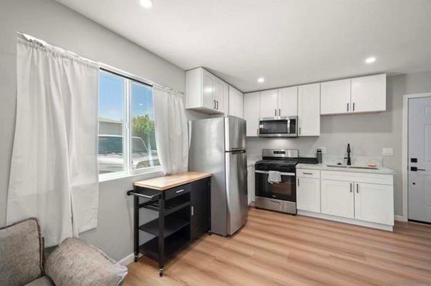 Interior, Kitchen, Recessed Lighting, Stainless Steel Appliances, Wood Texture Flooring