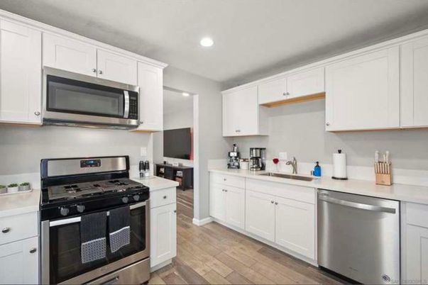Interior, Kitchen, Recessed Lighting, Stainless Steel Appliances, Wood Texture Flooring