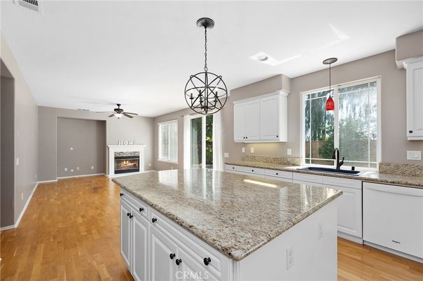 Chandelier, Empty room, Fireplace, Interior, Kitchen, Pendant Lights, Wood Texture Flooring