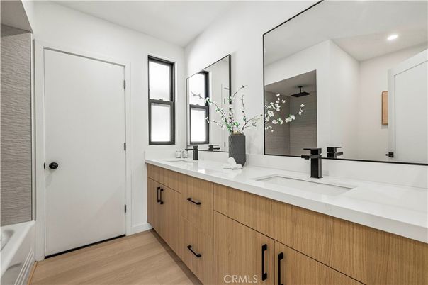 Bathroom, Dual Sink Vanities, Interior, Recessed Lighting, Wood Texture Flooring