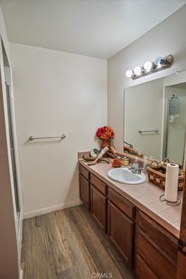 Bathroom, Dual Sink Vanities, Interior, Tile Countertops, Wood Texture Flooring