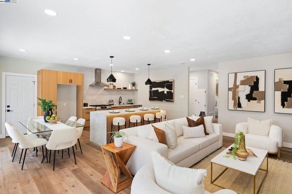 Dining room, Interior, Kitchen, Living room, Pendant Lights, Recessed Lighting, Stainless Steel Appliances, Wood Texture Flooring