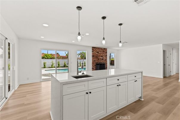 Fireplace, Interior, Kitchen, Pendant Lights, Recessed Lighting, Wood Texture Flooring