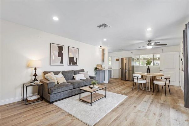 Dining room, Interior, Kitchen, Living room, Recessed Lighting, Stainless Steel Appliances, Wood Texture Flooring