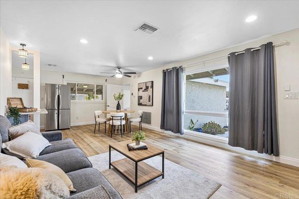 Dining room, Interior, Kitchen, Living room, Pendant Lights, Recessed Lighting, Stainless Steel Appliances, Wood Texture Flooring