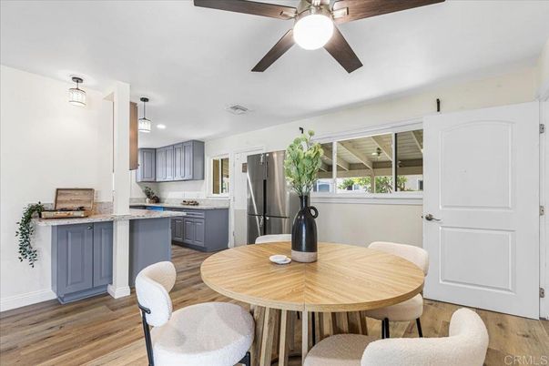 Dining room, Interior, Kitchen, Pendant Lights, Stainless Steel Appliances, Wood Texture Flooring