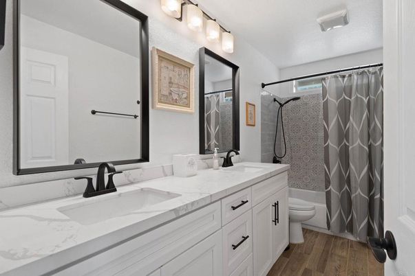 Bathroom, Dual Sink Vanities, Glass Shower, Interior, Wood Texture Flooring