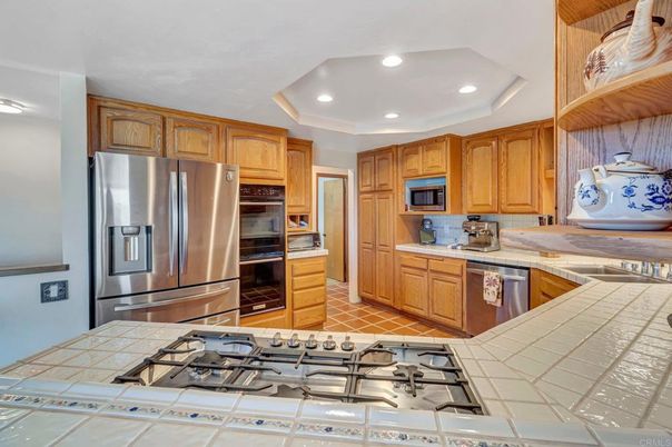 Interior, Kitchen, Recessed Lighting, Stainless Steel Appliances, Tile Countertops