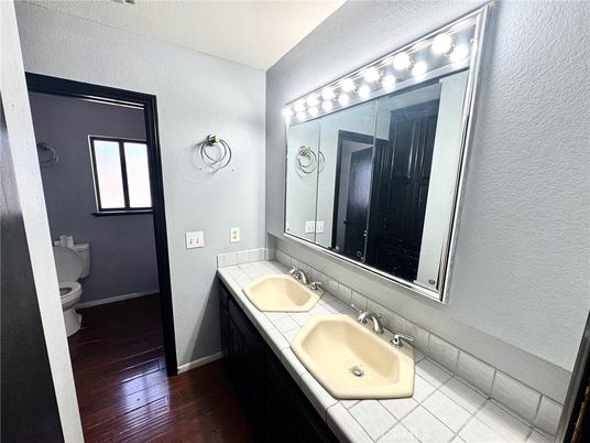 Bathroom, Dual Sink Vanities, Interior, Tile Countertops, Wood Texture Flooring