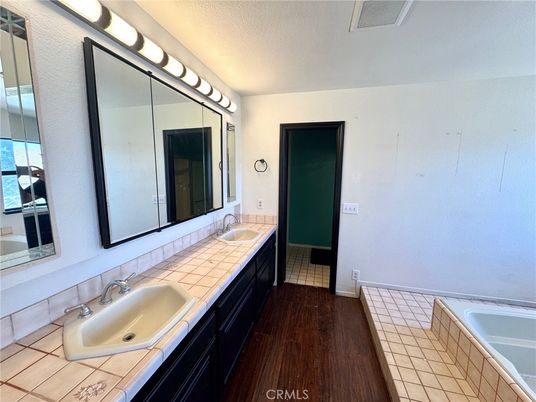 Bathroom, Dual Sink Vanities, Interior, Tile Countertops, Wood Texture Flooring