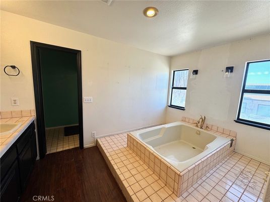 Bathroom, Interior, Recessed Lighting, Tile Countertops, Wood Texture Flooring