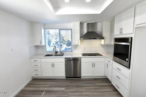 Interior, Kitchen, Recessed Lighting, Stainless Steel Appliances, Wood Texture Flooring