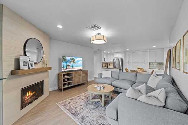 Fireplace, Interior, Kitchen, Living room, Recessed Lighting, Stainless Steel Appliances, Wood Texture Flooring