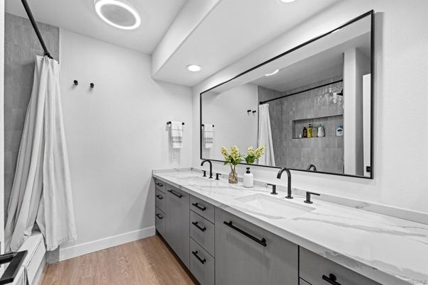 Bathroom, Dual Sink Vanities, Interior, Recessed Lighting, Wood Texture Flooring