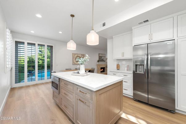 Fireplace, Interior, Kitchen, Pendant Lights, Recessed Lighting, Stainless Steel Appliances, Wood Texture Flooring