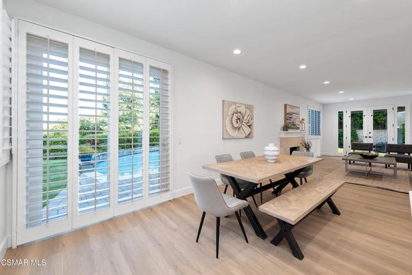 Dining room, Fireplace, Interior, Living room, Recessed Lighting, Wood Texture Flooring