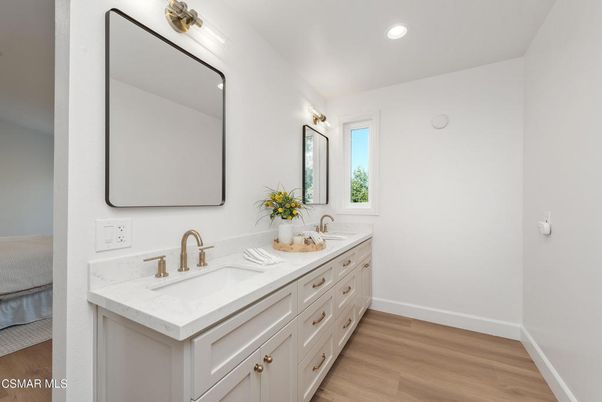 Bathroom, Dual Sink Vanities, Interior, Recessed Lighting, Wood Texture Flooring