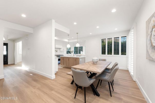 Dining room, Interior, Kitchen, Pendant Lights, Recessed Lighting, Stainless Steel Appliances, Wood Texture Flooring