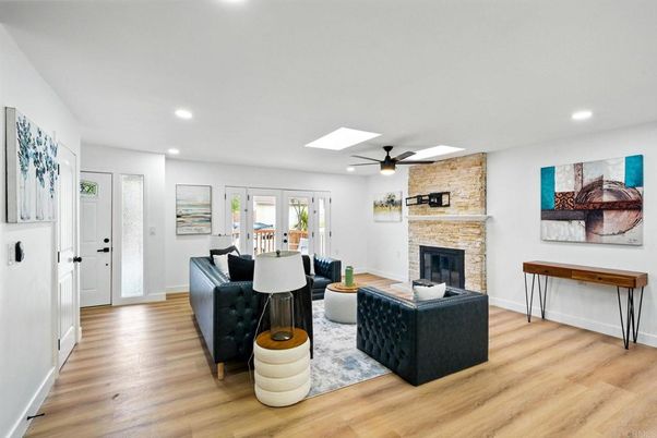 Fireplace, Interior, Living room, Recessed Lighting, Stone Walls, Wood Texture Flooring