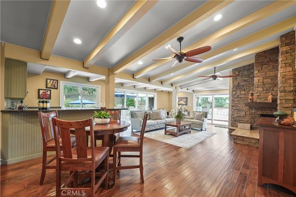 Dining room, Interior, Living room, Recessed Lighting, Stone Walls, Wood Texture Flooring